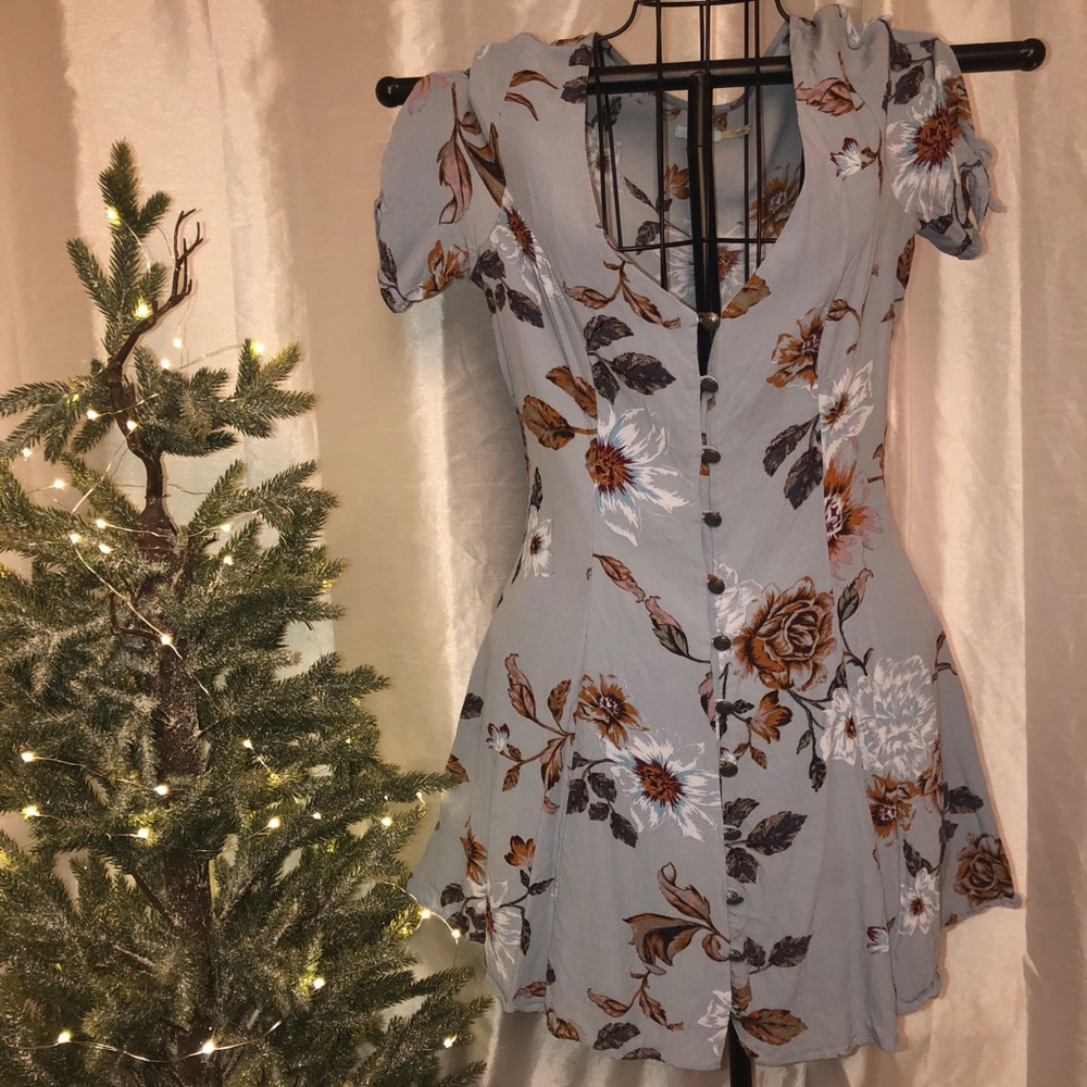 Urban Outfitters—Flowy bohemian button down dress.